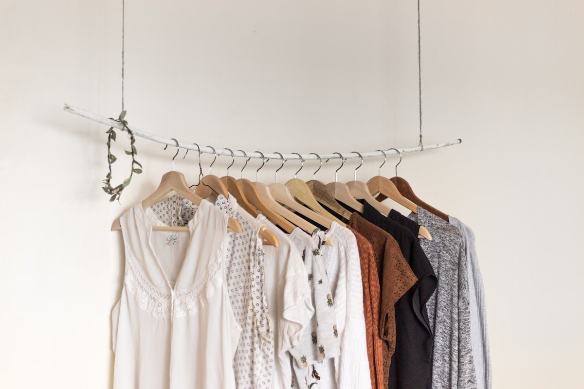 Woman styling a timeless ESPIRIT wardrobe